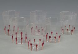 Twelve Giampolo Nason Murano drinking glasses with red decoration, in original boxes