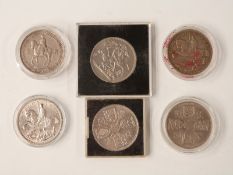 A collection of UK crowns to include 1935 rocking horse, Festival of Britain, 1953 Coronation etc
