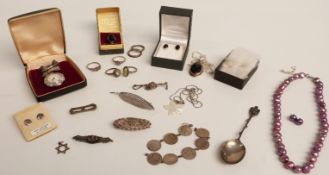 A collection of silver jewellery including rings, brooches, Victorian good luck brooch, marcasite