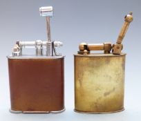 Two table lighters, one Jumbo patent no. 286838, the other Polaire with brass body, largest 10.3cm