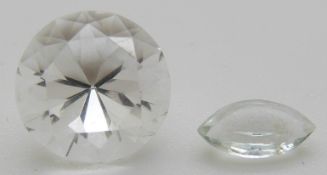 A round cut quartz of approximately 2.58ct and a marquise cut quartz of approximately 0.34ct