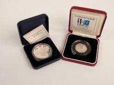 Silver piedfort UK Public Libraries fifty pence together with a Golden Jubilee regalia silver