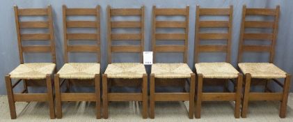 Set of six oak Arts and Crafts ladder back dining chairs with rush seats and Liberty of London '