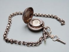Hallmarked silver pocket watch chain with attached George V hallmarked silver sovereign case,