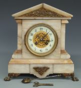 19th century architectural marbled cased mantel clock with two train movement by Marti, raised on