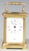L'Epée France 20thC miniature brass carriage clock in corniche style case, with enamelled Roman dial