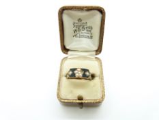 Georgian 18ct gold mourning ring set with plaited hair to the band and further set with enamel and