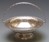 George V hallmarked silver swing handled pedestal bowl or basket, London 1924 maker's mark rubbed,