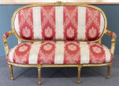 Louis XVI style giltwood upholstered salon sofa raised on six tapering legs, 161 x 62 x 101cm