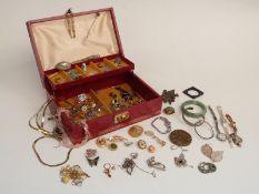 A collection of costume jewellery including watches, marcasite brooches, silver earrings, rose