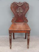 A 19thC shield back hall chair