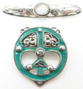 A silver brooch set with enamel by W H Darby & Sons Ltd and an Arts and Crafts style brooch set with
