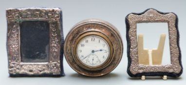 Two small hallmarked silver photograph frames each to suit approx 2 x 1.5 inch photo together with a