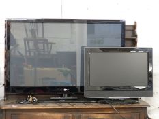 LG 42PJ550 42 inch flatscreen TV together with a smaller John Lewis TV