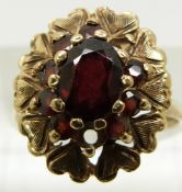 A 9ct gold ring set with garnets (size N)