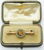 Edwardian love knot brooch set with turquoise and seed pearls, in original box, 3.5cm