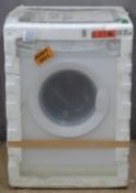 Candy CNW36T-80 washer dryer, new in original packaging