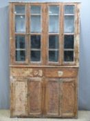 19th century pine housekeeper's cupboard with glazed upper section, the base fitted to drawers above