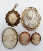 A brooch set with a cameo dated 1947, 9ct gold brooch set with a cameo and three other cameos
