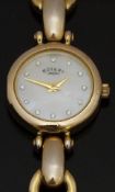 Rotary gold plated ladies wristwatch ref. 10700 with gold hands, mother of pearl effect dial,