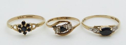 Two 9ct gold rings set with sapphires and a 9ct gold ring set with a sapphire and diamonds