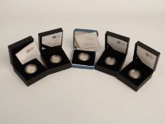 Five cased silver proof piedfort £1 coins comprising 2007, 2008, 2008 Royal Shield of Arms, 2010