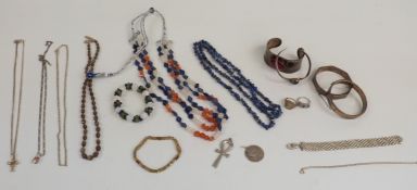 A silver gilt bracelet, two silver rings, silver necklaces, silver bangles, silver St Christopher