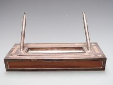 Garrard & Co. Ltd hallmarked silver mounted desk stand with central pen tray flanked by two pens,