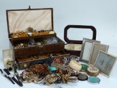 A collection of costume jewellery including brooches, large earrings, watches etc