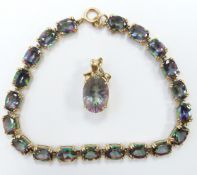 A 9ct gold bracelet set with mystic topaz and a similar pendant