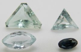 Two triangular cut (approx 2.8ct and 1.3ct), a marquise cut aquamarine (approximately 0.85ct) and