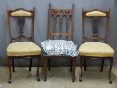 Three Edwardian upholstered dining chairs