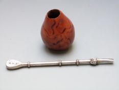 White metal Bombilla straw, marked to end 800, length 21cm, weight 44g together with a seed pod