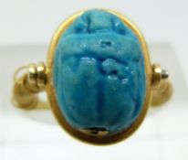 A 19thC Egyptian Revival ring set with a ceramic scarab beetle (size F/G)