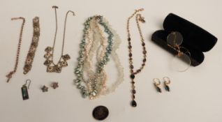 A collection of jewellery including The Royal Sussex brooch, silver bracelet, silver earrings,