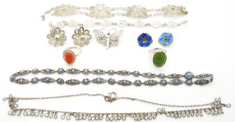 A silver necklace set with marcasite and blue paste, filigree brooch, bracelet and earrings,