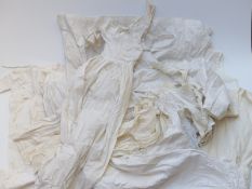 A quantity of mainly 19thC skirts, petticoats and nightclothes, some with lace trim and