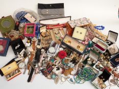 A collection of costume jewellery including brooches, necklaces, earrings etc