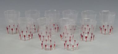 Twenty two Giampolo Nason Murano drinking glasses with red decoration, in original boxes