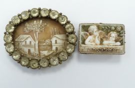 Victorian cameo surrounded by paste and a Victorian brooch depicting two cherubs, (largest - width