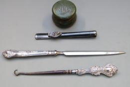 Swan metal pocket pen holder, travelling inkwell and two silver handled items