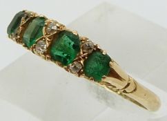 Edwardian 18ct gold ring set with four square cut emeralds and diamonds, Chester 1904