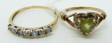 A 9ct gold ring set with a peridot and diamonds and a 9ct gold ring set with topaz and diamonds