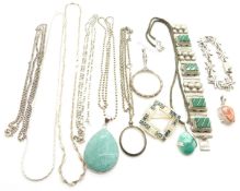 A collection of jewellery including silver pendants, silver chains/ necklaces, silver locket, silver