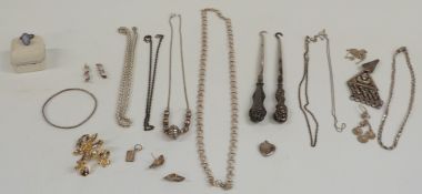 A collection of jewellery including silver necklaces, silver ring, button hooks etc