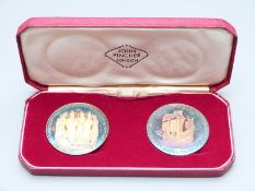 A pair of cased John Pinches medallions commemorating the 350th anniversary of the sailing of the