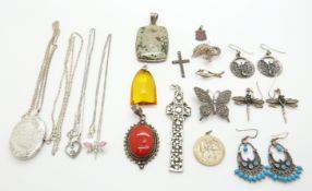 A collection of silver jewellery including pendants, earrings, St Christopher, locket, agate pendant