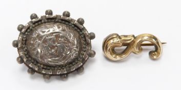 Victorian silver brooch and a Victorian yellow metal 