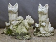 Two garden models of foxes, height 42cm and a similar squirrel