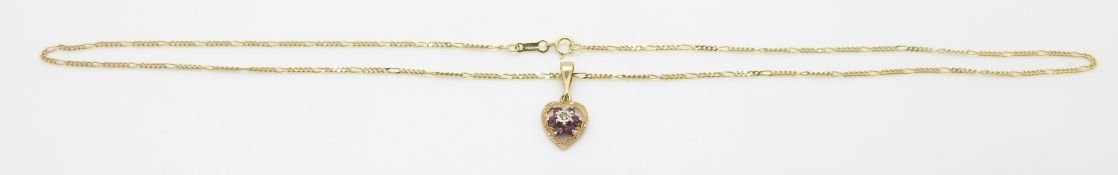 A 9ct gold pendant set with a diamond and rubies on a 9ct gold chain, 2.6g, 24.5cm drop